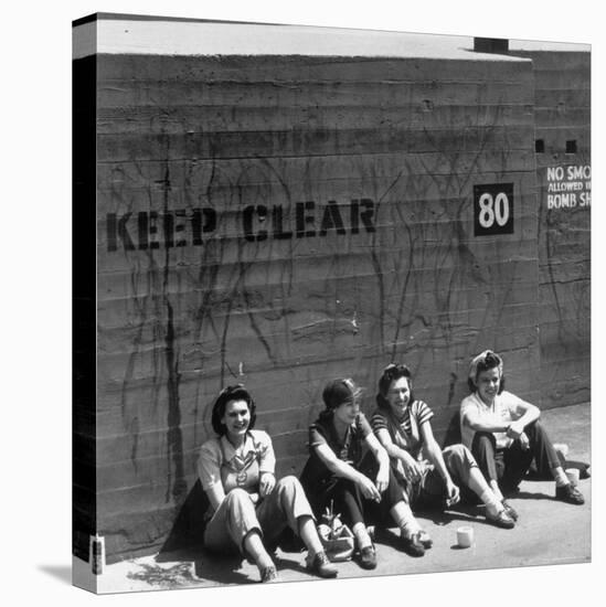 Workers Sitting Against Wall During Lunch Break, at Vega Aircraft Plant, During WWII: Burbank, Ca-Charles Fenno Jacobs-Stretched Canvas