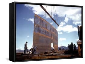 Workers Watching as Steel Beam is Raised High Above During Sub Assembling of Ship at Shipyard-Hansel Mieth-Framed Stretched Canvas