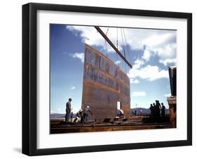 Workers Watching as Steel Beam is Raised High Above During Sub Assembling of Ship at Shipyard-Hansel Mieth-Framed Photographic Print