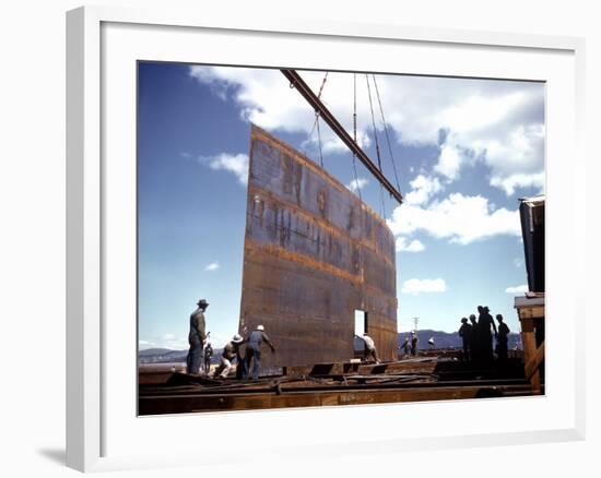 Workers Watching as Steel Beam is Raised High Above During Sub Assembling of Ship at Shipyard-Hansel Mieth-Framed Photographic Print