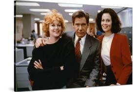 Working Girl by MikeNichols with Harrison Ford Melanie Griffith and Sigourney Weaver, 1988 (photo)-null-Stretched Canvas