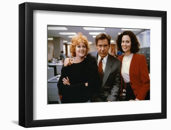 Working Girl by MikeNichols with Harrison Ford Melanie Griffith and Sigourney Weaver, 1988 (photo)-null-Framed Photo