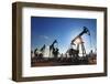 Working Oil Pumps Silhouette against Sun-Kokhanchikov-Framed Photographic Print