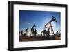 Working Oil Pumps Silhouette against Sun-Kokhanchikov-Framed Photographic Print