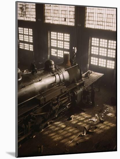 Working on a locomotive at the 40th Street railroad shops, Chicago, 1942-Jack Delano-Mounted Giclee Print