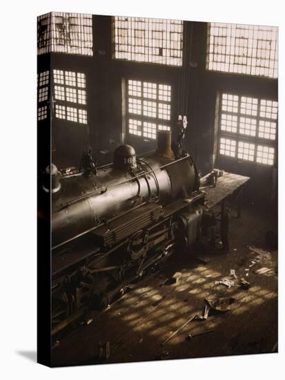 Working on a locomotive at the 40th Street railroad shops, Chicago, 1942-Jack Delano-Stretched Canvas