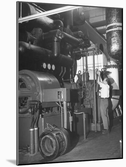 Working on Large Air Conditioning Units Used for Environmental Testing of Military Equipment-Ralph Morse-Mounted Premium Photographic Print