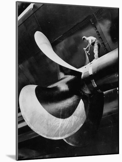 Workman Checking Out One of the Newly Constructed 34 Ton Propellers-Alfred Eisenstaedt-Mounted Photographic Print