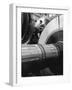 Workman on Large Wheel That Looks Like Fan, at General Electric Laboratory-Alfred Eisenstaedt-Framed Premium Photographic Print