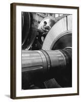 Workman on Large Wheel That Looks Like Fan, at General Electric Laboratory-Alfred Eisenstaedt-Framed Photographic Print