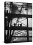 Workmen Against Smokey Sky as They Stand on Girders of the New Carnegie Illinois Steel Plant-Margaret Bourke-White-Stretched Canvas