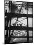 Workmen Against Smokey Sky as They Stand on Girders of the New Carnegie Illinois Steel Plant-Margaret Bourke-White-Mounted Photographic Print