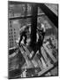 Workmen Attach Steel Beams Above Street During Construction of the Manhattan Company Building-Arthur Gerlach-Mounted Premium Photographic Print