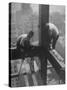 Workmen Attaching Steel Beams High Above Street During Construction of Manhattan Company Building-Arthur Gerlach-Stretched Canvas