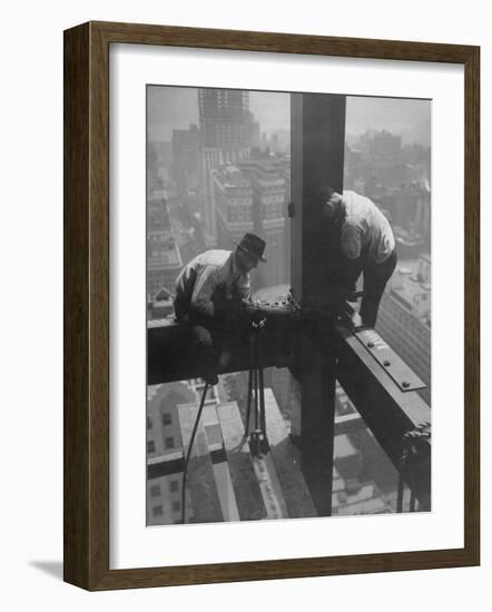 Workmen Attaching Steel Beams High Above Street During Construction of Manhattan Company Building-Arthur Gerlach-Framed Photographic Print