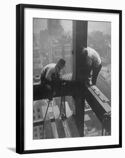 Workmen Attaching Steel Beams High Above Street During Construction of Manhattan Company Building-Arthur Gerlach-Framed Photographic Print