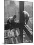 Workmen Attaching Steel Beams High Above Street During Construction of Manhattan Company Building-Arthur Gerlach-Mounted Photographic Print