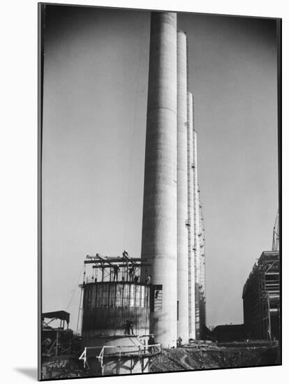 Workmen Building Huge Chimneys at World's Biggest Coal-Fueled Power Plant-Margaret Bourke-White-Mounted Photographic Print