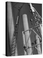 Workmen Builiding Chimneys at World's Biggest Coal-Fueled Generating Plant-Margaret Bourke-White-Stretched Canvas