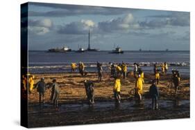 Workmen Cleaning Up after Oil Spill-null-Stretched Canvas