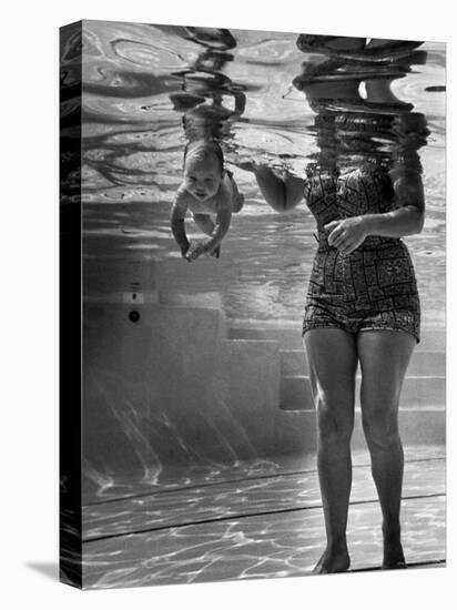 World's Youngest Swimmer Julie Sheldon, 9 Weeks Old, Swimming Underwater-Ed Clark-Stretched Canvas