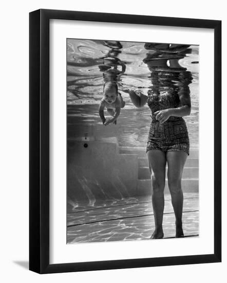 World's Youngest Swimmer Julie Sheldon, 9 Weeks Old, Swimming Underwater-Ed Clark-Framed Photographic Print