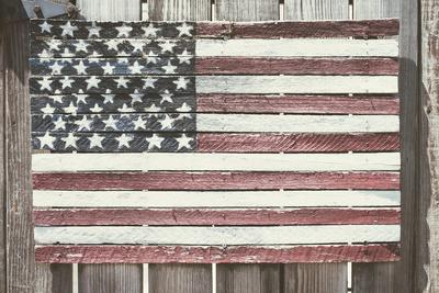 https://imgc.allpostersimages.com/img/posters/worn-wooden-american-flag-fire-island-new-york_u-L-Q12T1PP0.jpg?artPerspective=n