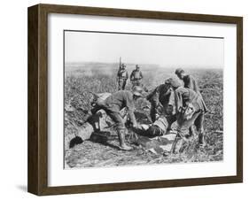 Wounded German Soldier Being Moved by Prisoners, Aisne, France, 18 July, 1918-null-Framed Giclee Print