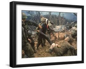 Wounded Marine Gunnery Sgt. Jeremiah Purdie During the Vietnam War-Larry Burrows-Framed Photographic Print