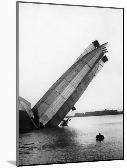 Wreck of Britain's Greatest Airship, the Mayfly, at Barrow, 1911-Thomas E. & Horace Grant-Mounted Photographic Print