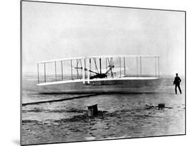 Wright Brothers Wilbur and Orville with 1903 Airplane "Kitty Hawk" on First Flight-null-Mounted Premium Photographic Print