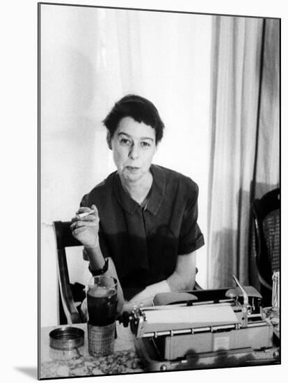 Writer Carson McCullers Sitting at Typewriter-Leonard Mccombe-Mounted Premium Photographic Print