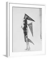 Writer Gloria Steinem Carrying Pennants for Professional Football Teams-Yale Joel-Framed Premium Photographic Print