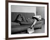 Writer Niven Busch Lying on Sofa with Newspaper over His Face as He Takes Nap from Screenwriting-Paul Dorsey-Framed Photographic Print