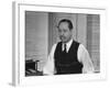 Writer Robert Benchley, Sitting at His Desk with a Small Wade of Paper in His Mouth-Bernard Hoffman-Framed Premium Photographic Print