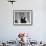 Writer Robert Benchley, Sitting at His Desk with a Small Wade of Paper in His Mouth-Bernard Hoffman-Framed Premium Photographic Print displayed on a wall