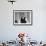 Writer Robert Benchley, Sitting at His Desk with a Small Wade of Paper in His Mouth-Bernard Hoffman-Framed Premium Photographic Print displayed on a wall