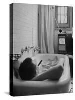 Writer Russell Finch Taking Portable Television Set to Bathroom During His Bath-George Skadding-Stretched Canvas