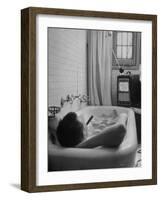 Writer Russell Finch Taking Portable Television Set to Bathroom During His Bath-George Skadding-Framed Photographic Print