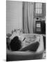 Writer Russell Finch Taking Portable Television Set to Bathroom During His Bath-George Skadding-Mounted Photographic Print