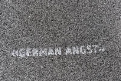 https://imgc.allpostersimages.com/img/posters/writing-german-angst-on-a-footpath-hamburg-germany_u-L-Q11WWHQ0.jpg?artPerspective=n
