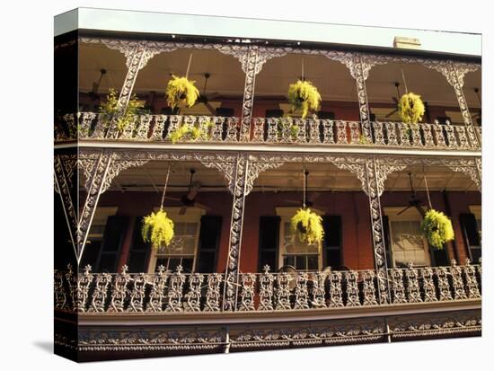 Wrought Iron Architecture and Baskets, French Quarter, New Orleans, Louisiana, USA-Adam Jones-Stretched Canvas