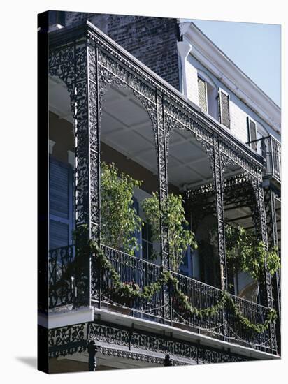 Wrought Iron Balcony, French Quarter, New Orleans, Louisiana, USA-Charles Bowman-Stretched Canvas