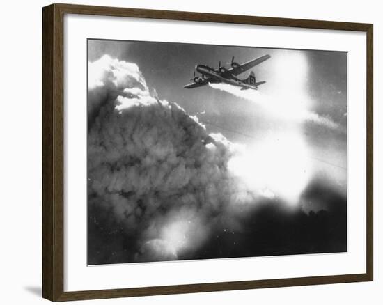 WWII U.S. Superfortress Afire-null-Framed Photographic Print