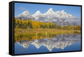 Wyoming, Grand Teton NP. Fresh snowfall covers the Grand Teton Mountains on an autumn morning-Elizabeth Boehm-Framed Stretched Canvas