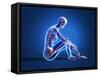 X-Ray View of a Woman Sitting on Floor with Skeletal Bones Superimposed-null-Framed Stretched Canvas