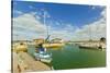 Yacht at marina by Quai de La Criee in the island's principal western town, Ars en Re, Ile de Re, C-Robert Francis-Stretched Canvas