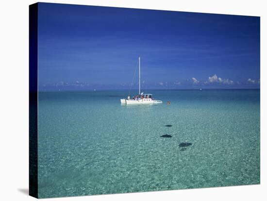 Yacht Moored in the North Sound, with Stringrays Visible Beneath the Water, Cayman Islands-Tomlinson Ruth-Stretched Canvas