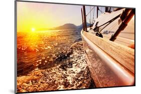 Yacht Sailing against Sunset. Sailboat. Yachting. Sailing. Travel Concept. Vacation-Subbotina Anna-Mounted Photographic Print
