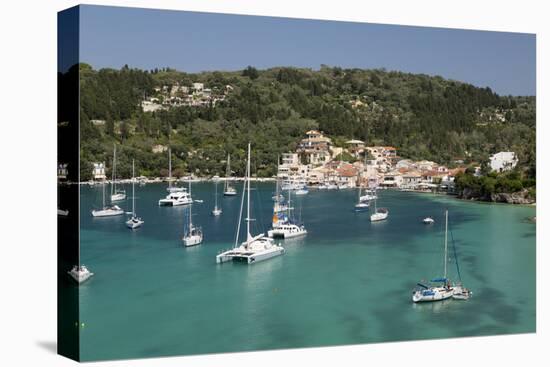 Yachts anchored in bay, Lakka, Paxos, Ionian Islands, Greek Islands, Greece, Europe-Stuart Black-Stretched Canvas